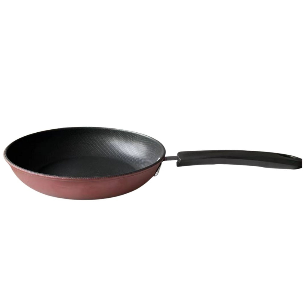 Side view of a 10-inch nonstick frying pan with a red exterior and black handle, suitable for induction stovetops.
