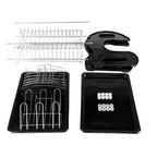 Flat lay view of 2-tier dish rack assembly parts including chrome wire shelves, black side panels, drain trays, and hardware screws.