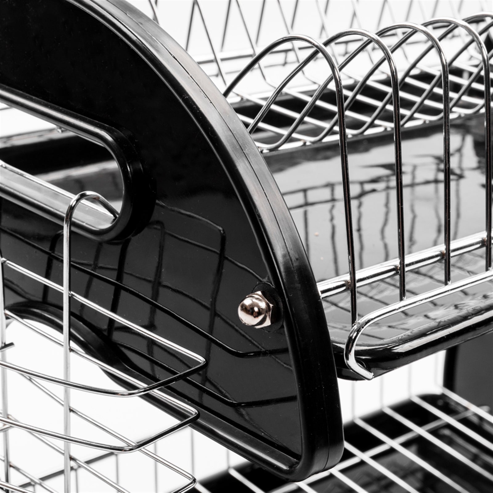 Close-up view of a 2-tier dish rack showing the glossy black side frame connected to chrome wire shelves with a metal dome nut.