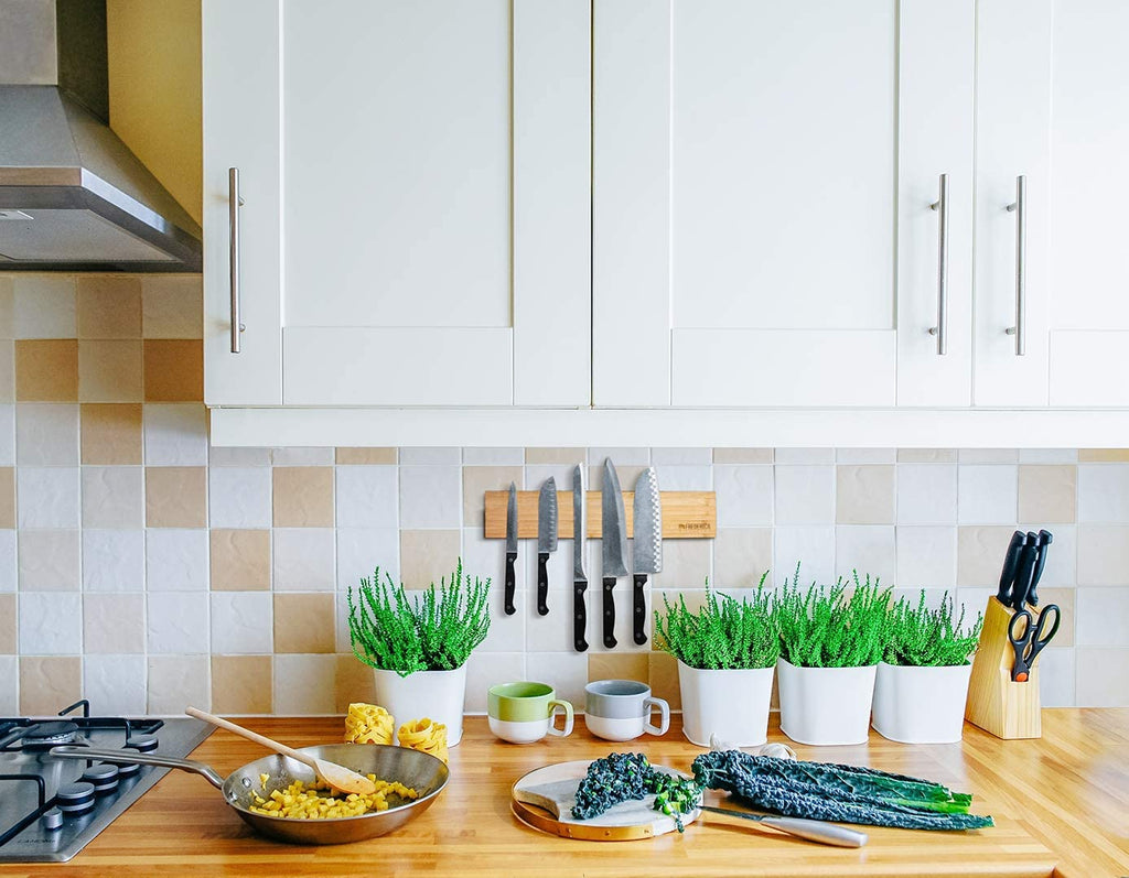 Declutter your countertops with premium kitchen organizers. Shop magnetic knife strips, expandable silverware drawer trays, & smart storage. Free shipping!