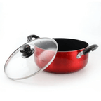 Metallic red aluminum nonstick Dutch oven pot with double black Bakelite side handles and a propped-open clear tempered glass lid.