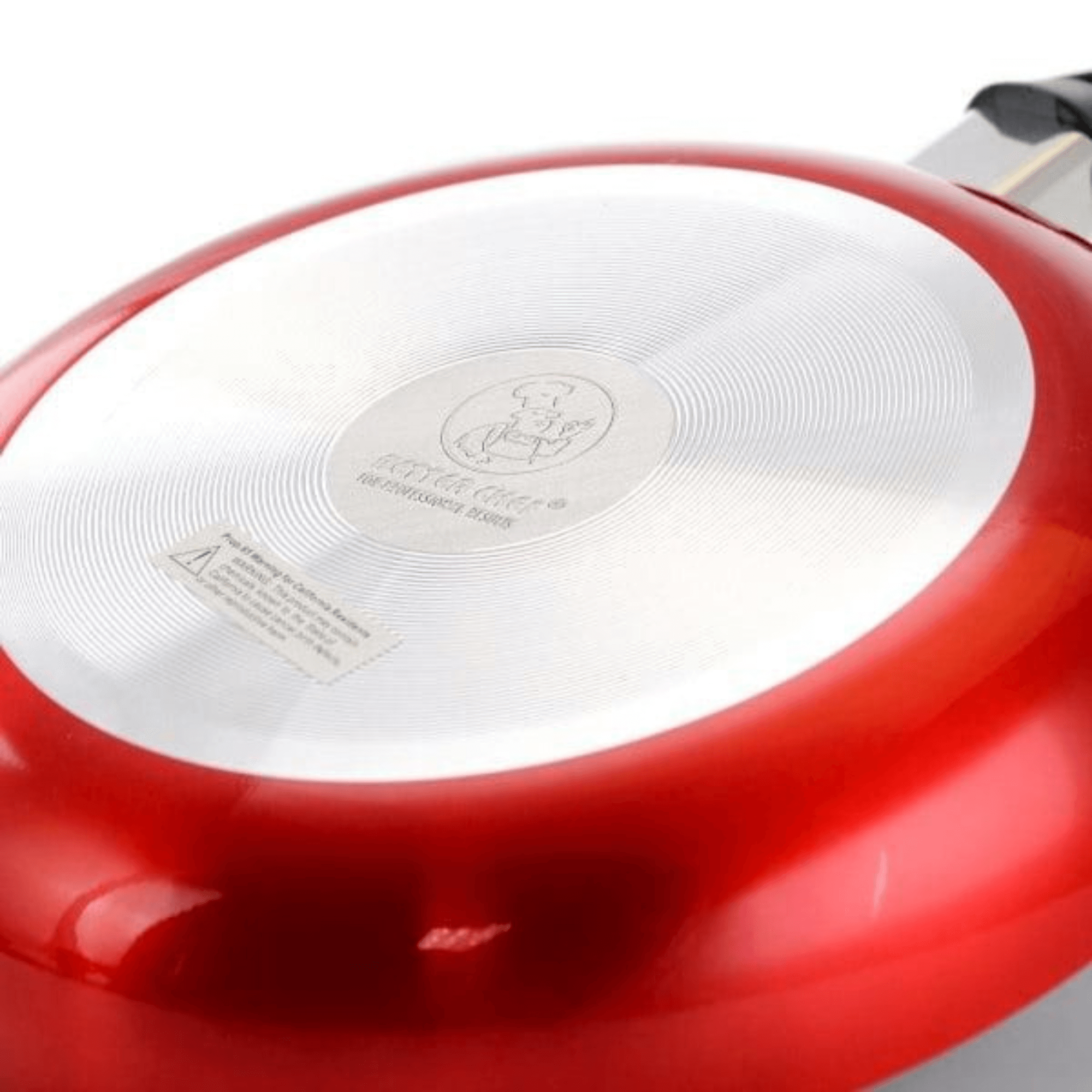 Close-up view of the smooth non-stick interior coating of a metallic red pan showing the secure dual-rivet handle connection.
